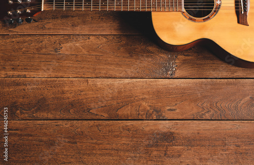 Foto classical guitar on wooden background