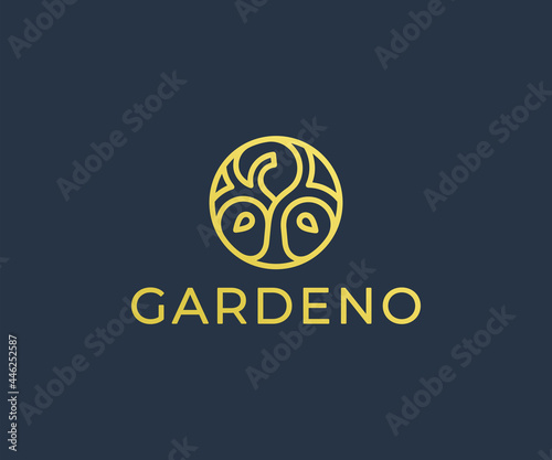 Round tree logo design. Abstract circle tree with branch and leaves vector design. Luxury forest logotype