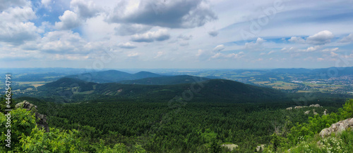 Panoramic View of Beautiful Landscape in Czech Republic. Panorama of Wooded Valley and Hill during Cloudy Day. © nicolecedik