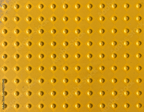 yellow tactile crosswalk sidewalk intersection pavement  rumble nonslip surface for waiting to cross the road