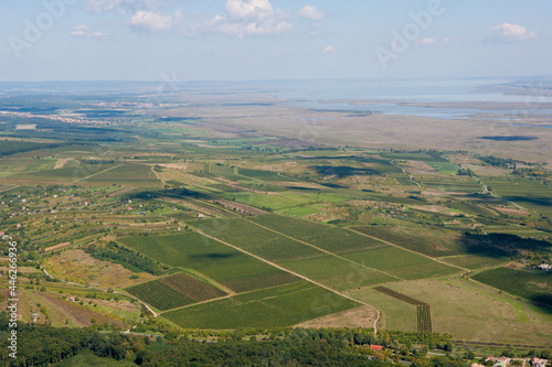 Aerial panoramic drone view of a beautiful Hungarian landscape on a moody summer morning. © antoineartaud