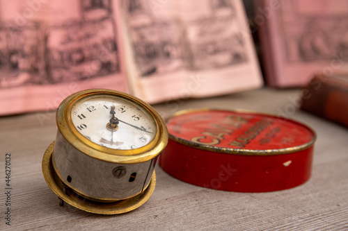 Old clock and books still life. Concept of time,the past or deadline.