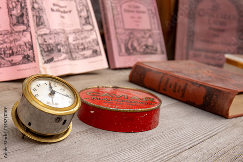 Old clock and books still life. Concept of time,the past or deadline.