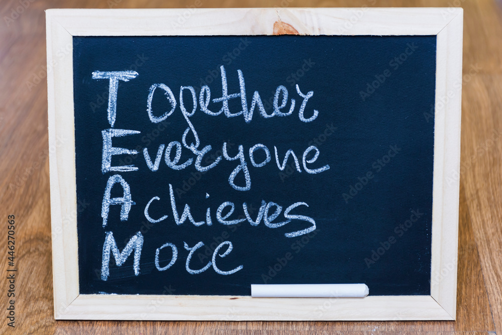 Team Concept with Chalk Board and Together Everyone Achieves More Text 