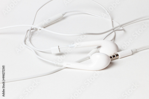 White headphones with a wire photo