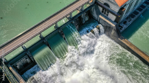Offene Schleusen beim Wasserkraftwerk Mühleberg im Kanton Bern nach dem Hochwasser 2021, Schweiz photo