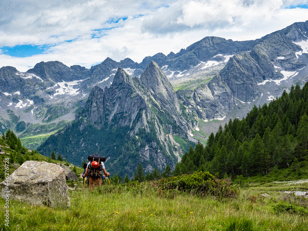 Trekking scene in the italian alps of Val Masino Trekking scene in the italian alps of Val Masino