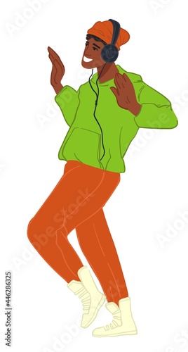 Teenager boy listening to music in headphones