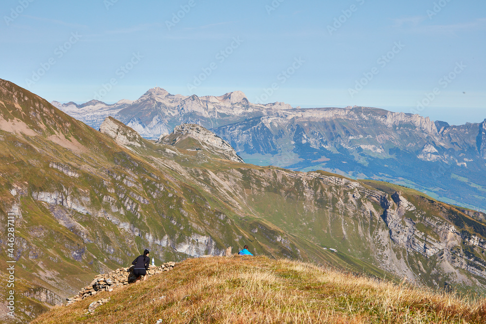 Couple sitting near summit of the Alvier