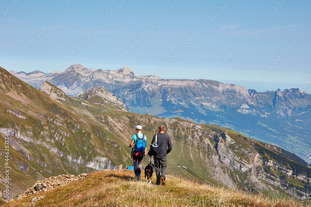 Couple sitting near summit of the Alvier