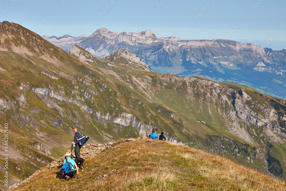 Couple sitting near summit of the Alvier