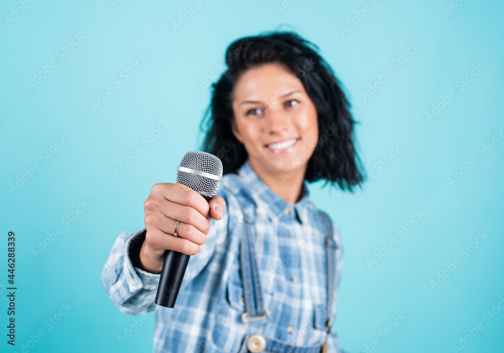 make your voice louder. singing a song with a microphone. having a party. Happy woman with microphone. karaoke concept. Singing Songs. public speaking. Lifestyle and People Concept. selective focus make your voice louder. singing a song with a microphone. having a party. Happy woman with microphone. karaoke concept. Singing Songs. public speaking. Lifestyle and People Concept. selective focus