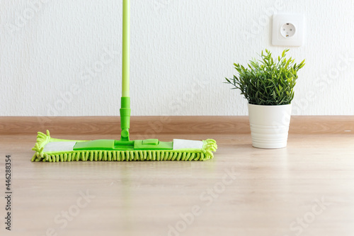 Mopping laminate floor. Household equipment