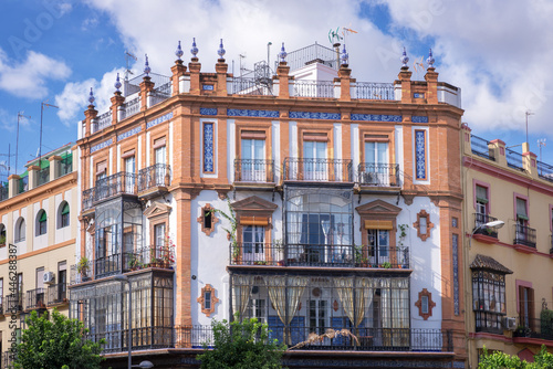Traditional building with bow windows, Triana district, Seville Spain photo