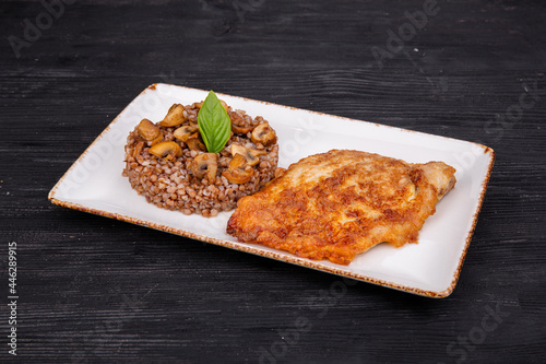 escalopes of pork with buckwheat, with mushrooms