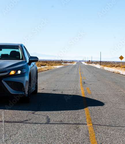 Car and straight road