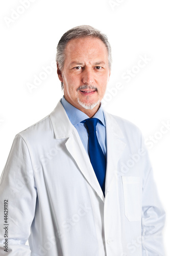 Smiling mature doctor © Minerva Studio