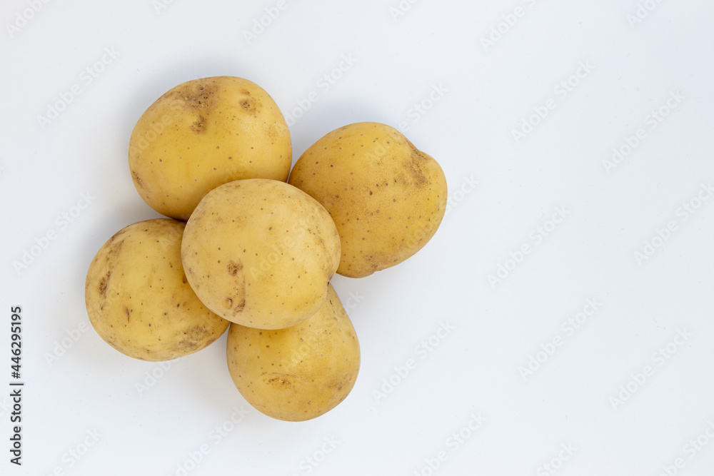 pile of potatoes isolated on white background pile of potatoes isolated on white background