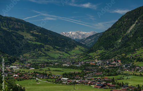 Bad Hofgastein town from fast austria train in middle of fresh color summer photo