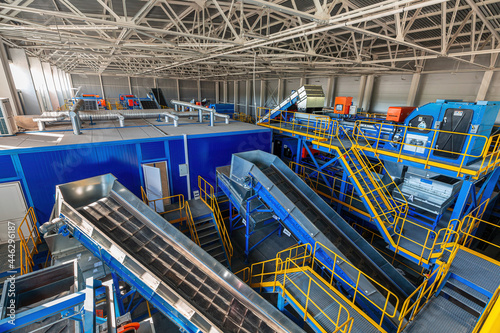 A modern plant for sorting and recycling household waste and waste. Large industrial complex of conveyors, bunkers. photo