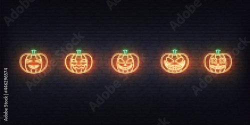 Halloween pumpkin neon sign. Set of bright Jack O Lantern for Halloween celebration