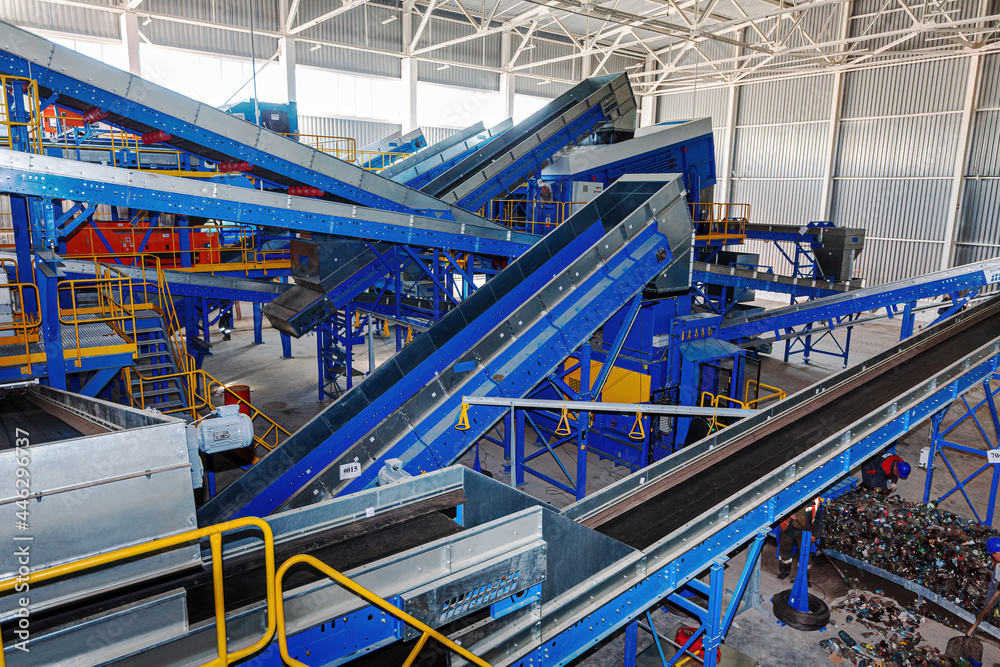 A modern plant for sorting and recycling household waste and waste. Large industrial complex of conveyors, bunkers.