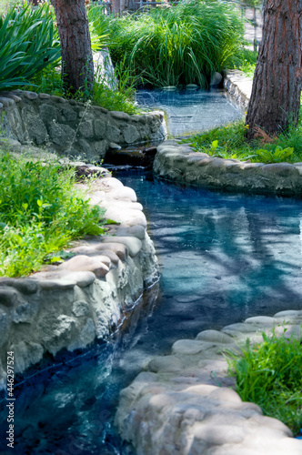 water stream in the park of European style. rest. landscape. High quality photo