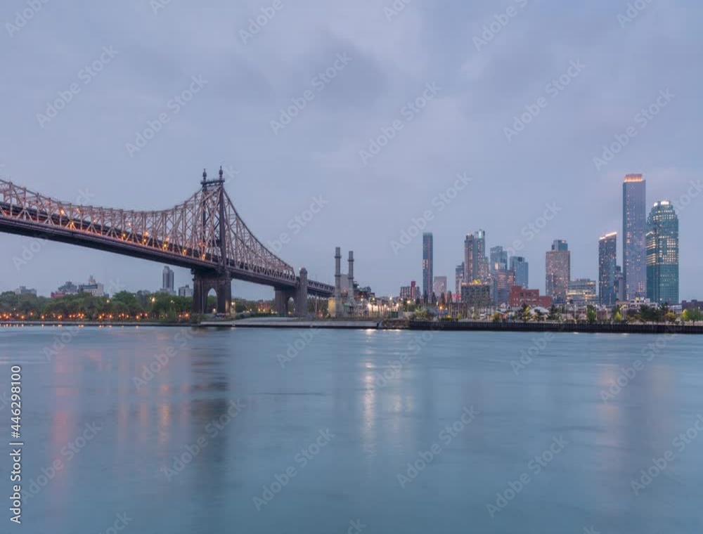 Queensboro Bridge and Roosevelt Island in day to night time lapse Queensboro Bridge and Roosevelt Island in day to night time lapse