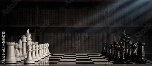 Fotografiet Chess pieces on a chessboard against the background of an old cabinet