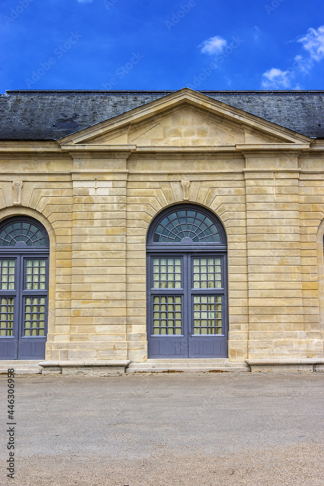 Fototapeta premium Fragment of Orangery building (built in 1686) in beautiful public Parc de Sceaux near old grand country house in Sceaux, Hauts-de-Seine, not far from Paris, France.