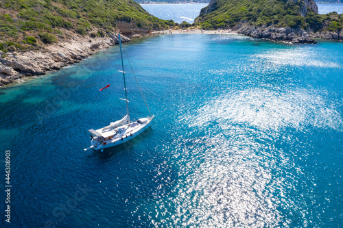 Alone yacht in Porto Timoni beach, Afionas is a paradise double beach,  Corfu, Greece © sola_sola