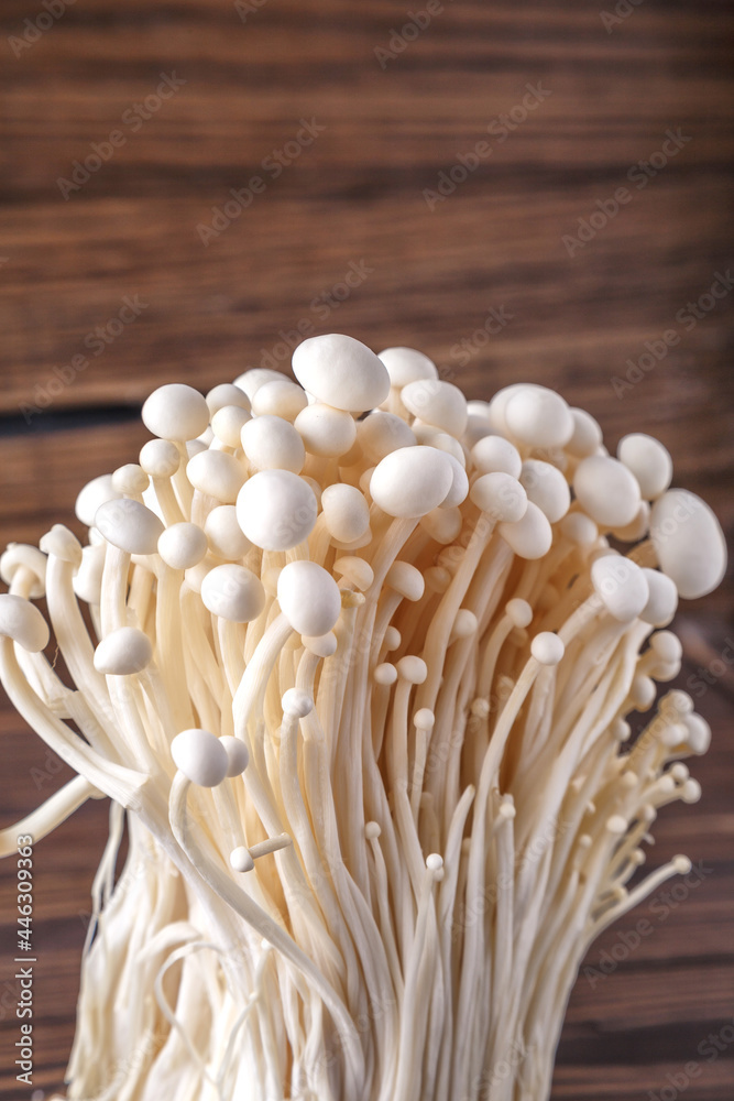 Fresh Enoki mushrooms  with selected focus.Enoki, also known as velvet shank, is a species of edible mushroom in the family Physalacriaceae.