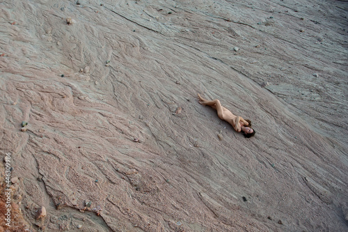 Naked woman in the desert