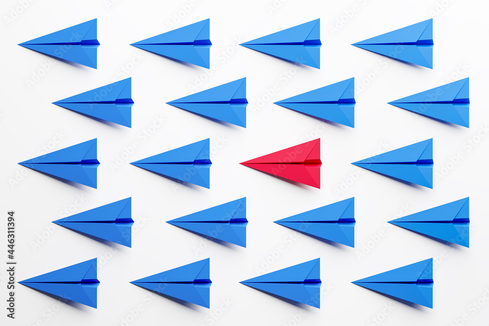 Blue paper airplanes on a white background with a red one in the center. Concept of leadership. 3d Render. Blue paper airplanes on a white background with a red one in the center. Concept of leadership. 3d Render.