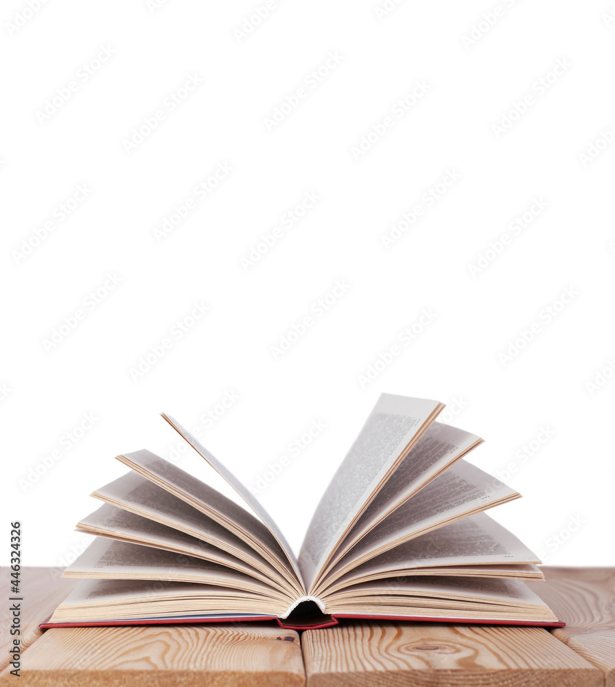 Fototapeta premium isolated open book on the wood table on the white background with copy space