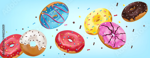 Falling glazed sweet buns on blue background. Realistic Colorful donuts with pink, chocolate, blue, yellow and white icing with sprinkle. Vector illustration.