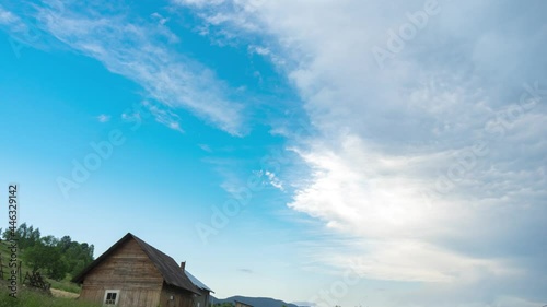 Thundercloud and clear sky over the village, time lapse