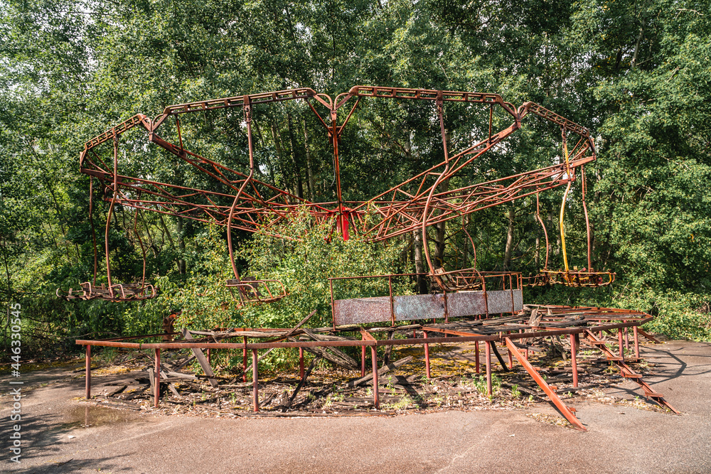 A view of abandoned rides in the decaying amusement park of Pripyat, Ukraine inside the Chernobyl Exclusion Zone