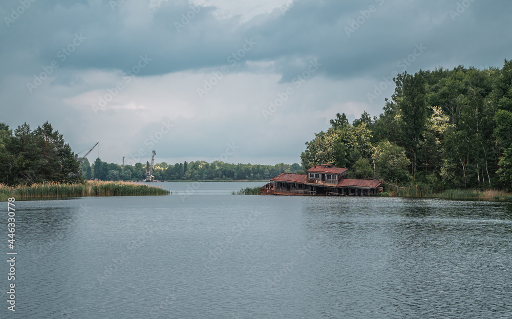 Panoramic view of an abandoned river cruise port in the Chernobyl Exclusion Zone near Pripyat, Ukraine