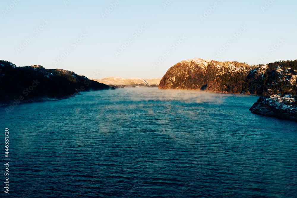 Frost smoke on a winter fjord of Middle Norway.