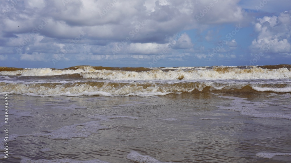 this is a picture of the waves crashing onto a local beach. this is a picture of the waves crashing onto a local beach.
