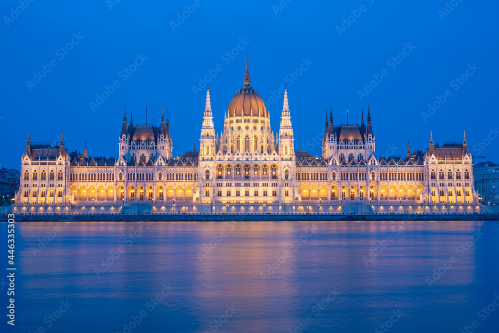 The famous parliament building in Budapest, Hungary during blue hour, illuminated