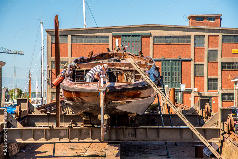 Den Helder, the Netherlands. 8 july 2021. Historic flatboat on the slipway at the Willemsoord shipyard in Den Helder.