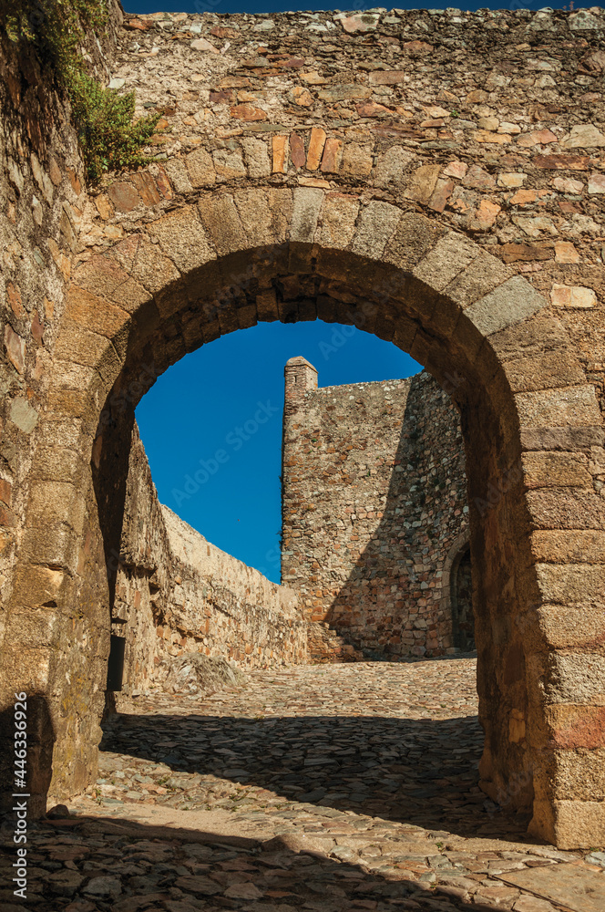 Stone gateway in the internal wall over sidewalk at the Marvao Castle. An amazing medieval fortified village in Portugal.