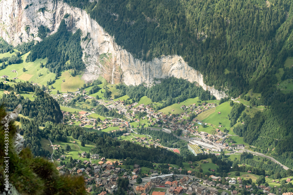 Lauterbrunnen valley Switzerland viewed from atop high 
 mountain at the Royal Walk, Mannlinchen