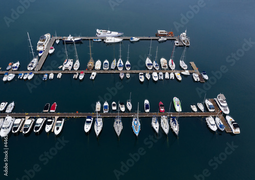 Aerial view to a yachts on the marina photo