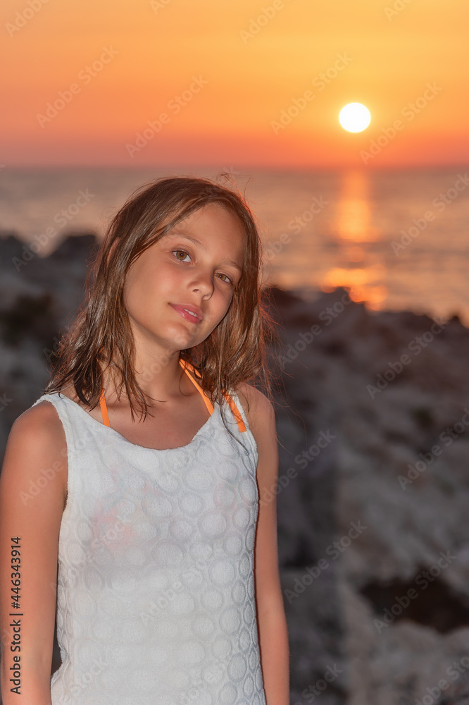 A nice girl on the beach at sunset A nice girl on the beach at sunset