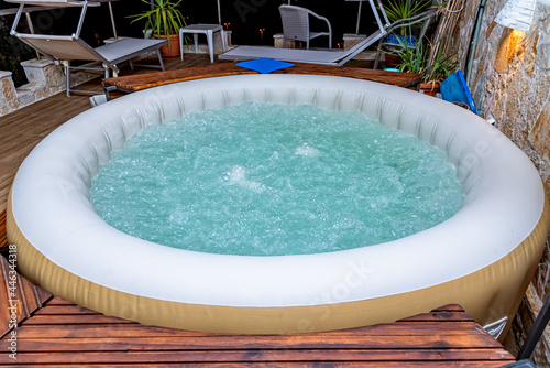 Hot Tub at a Luxury Resort. Outdoor hot tub and sea view © nedomacki