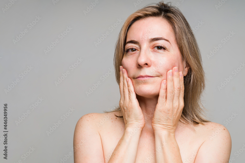 Middle aged woman in her 50s with healthy skin Middle aged woman in her 50s with healthy skin