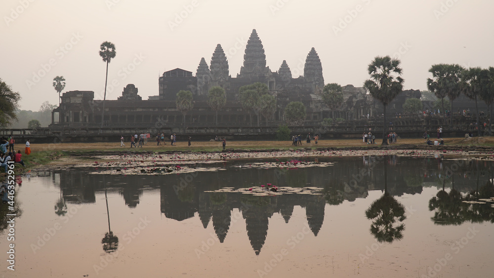 Naklejka premium Ancient Khmer Empire temples in Angkor Wat during sunset.